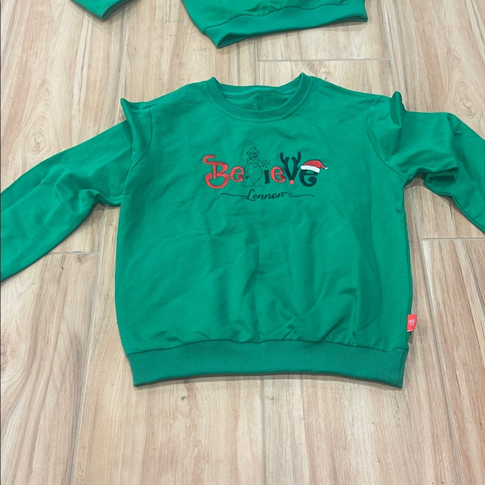 Vibrant Green Long Sleeve Hoodie with Graphic Design